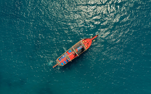 A graceful sailboat glides across the calm from Chrome web store to be run with OffiDocs Chromium online A graceful sailboat glides across the calm from Chrome web store to be run with OffiDocs Chromium online