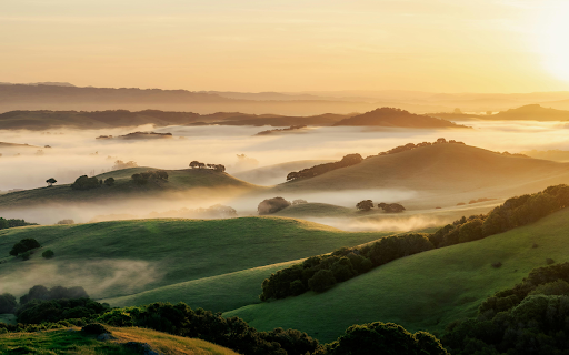 A sunrise over a valley with fog and hills from Chrome web store to be run with OffiDocs Chromium online A sunrise over a valley with fog and hills from Chrome web store to be run with OffiDocs Chromium online