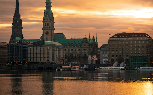 A sunset over the water with a church in the background from Chrome web store to be run with OffiDocs Chromium online A sunset over the water with a church in the background from Chrome web store to be run with OffiDocs Chromium online