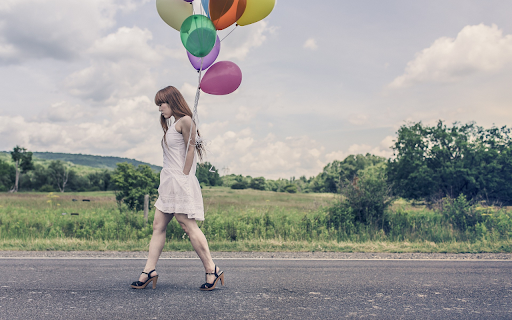 Girl holding balloons from Chrome web store to be run with OffiDocs Chromium online Girl holding balloons from Chrome web store to be run with OffiDocs Chromium online